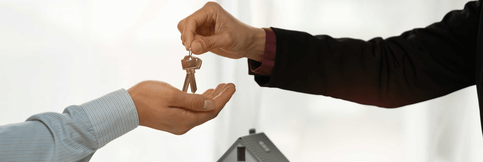 buying property in UAE handing keys to your new home